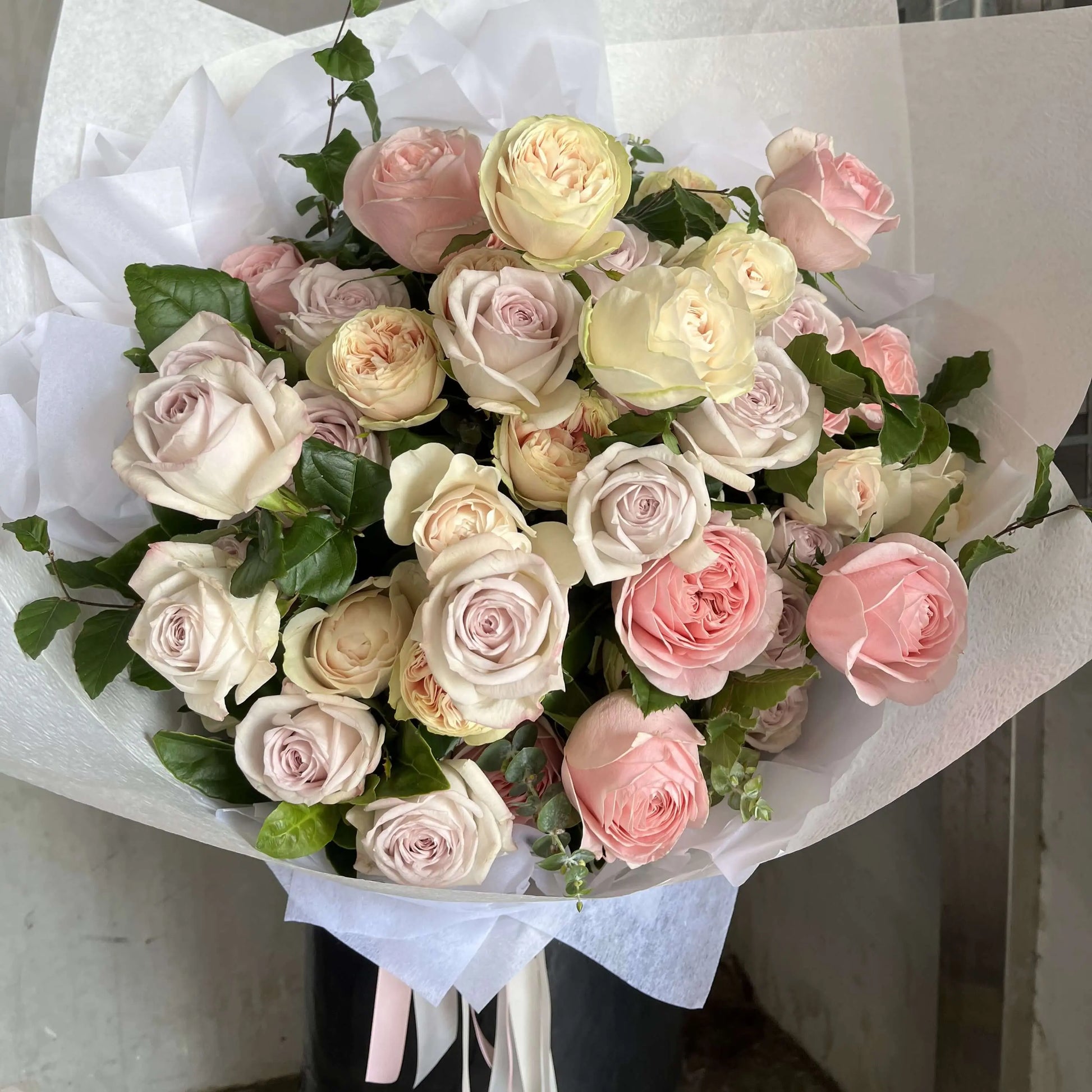 luxury rose bouquet Rose Dream beautifully arranged with soft blush and cream roses, perfect for florist near me.
